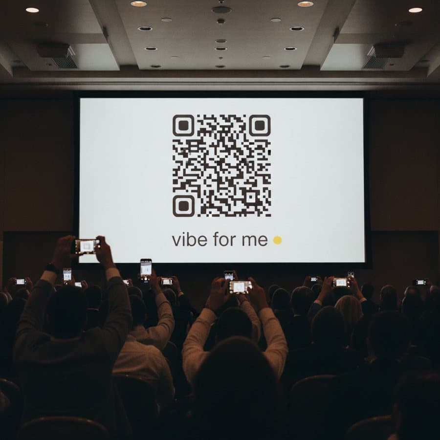 vibe for me QR code on a conference screen